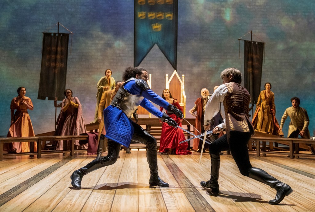 (L to R): Jordan Donica, Phillipa Soo (background), Andrew Burnap and the company in Lincoln Center Theater's production of 'Camelot' (courtesy of Joan Marcus)